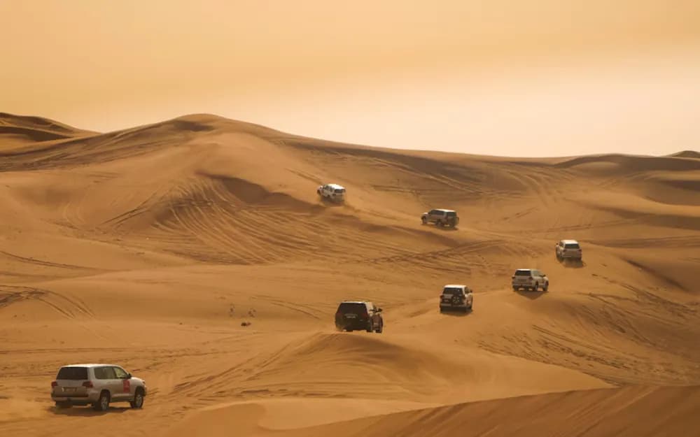 Dubai Sunset Premium Safari with Quads, Sandboarding & BBQ