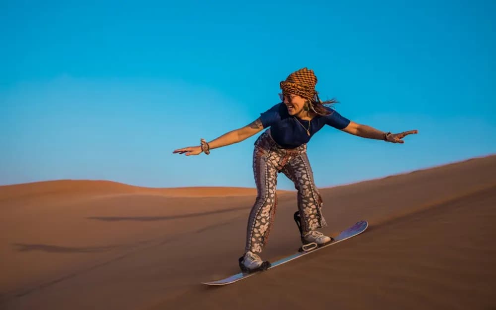Desert Safari, Camel Ride, Sandboarding, Falcon Experience and Dinner in Dubai